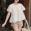 Áo babydoll dáng bí hoa chìm tay bồng